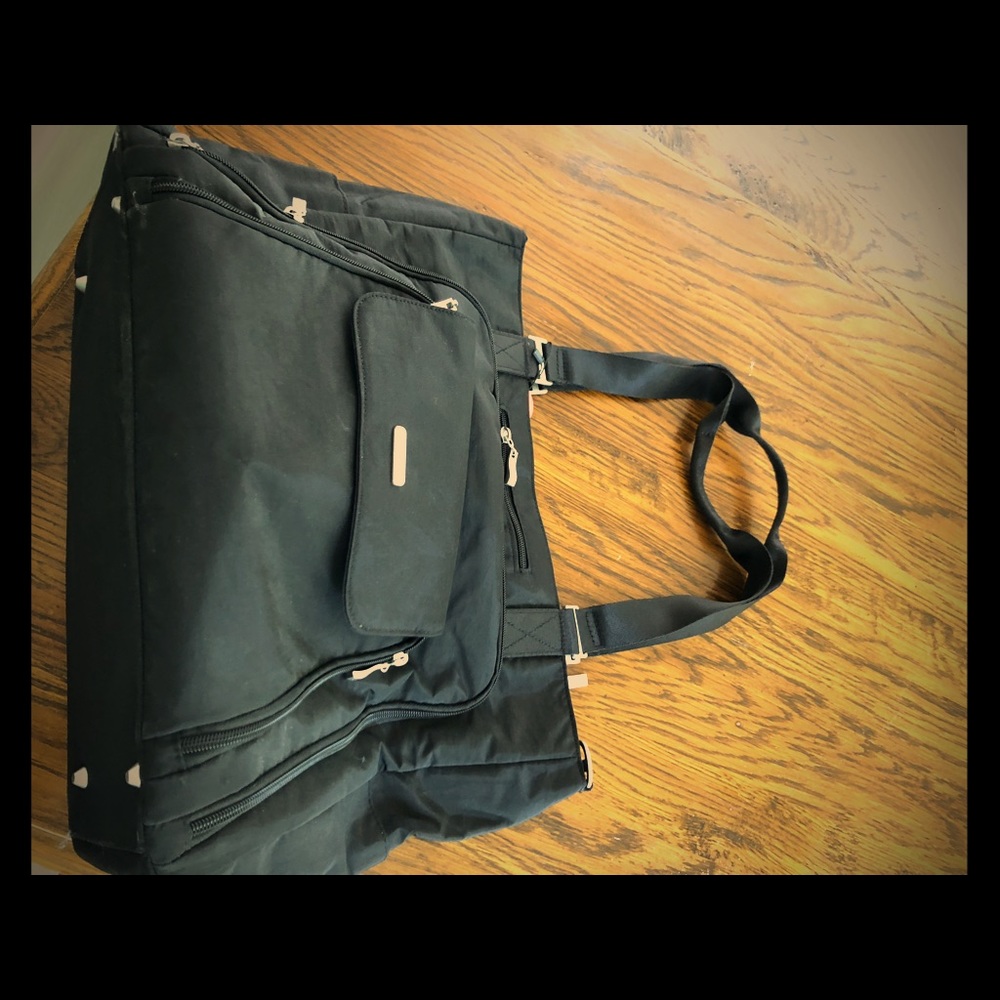 Baggallini carry on with luggage strap